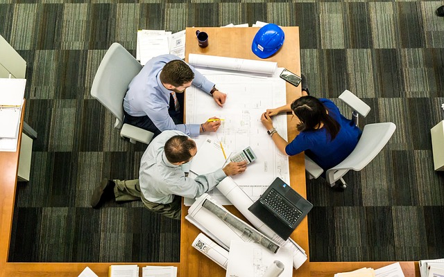 men and woman at a business meeting