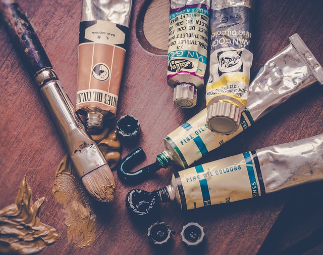 several tubes of paint with paint coming out