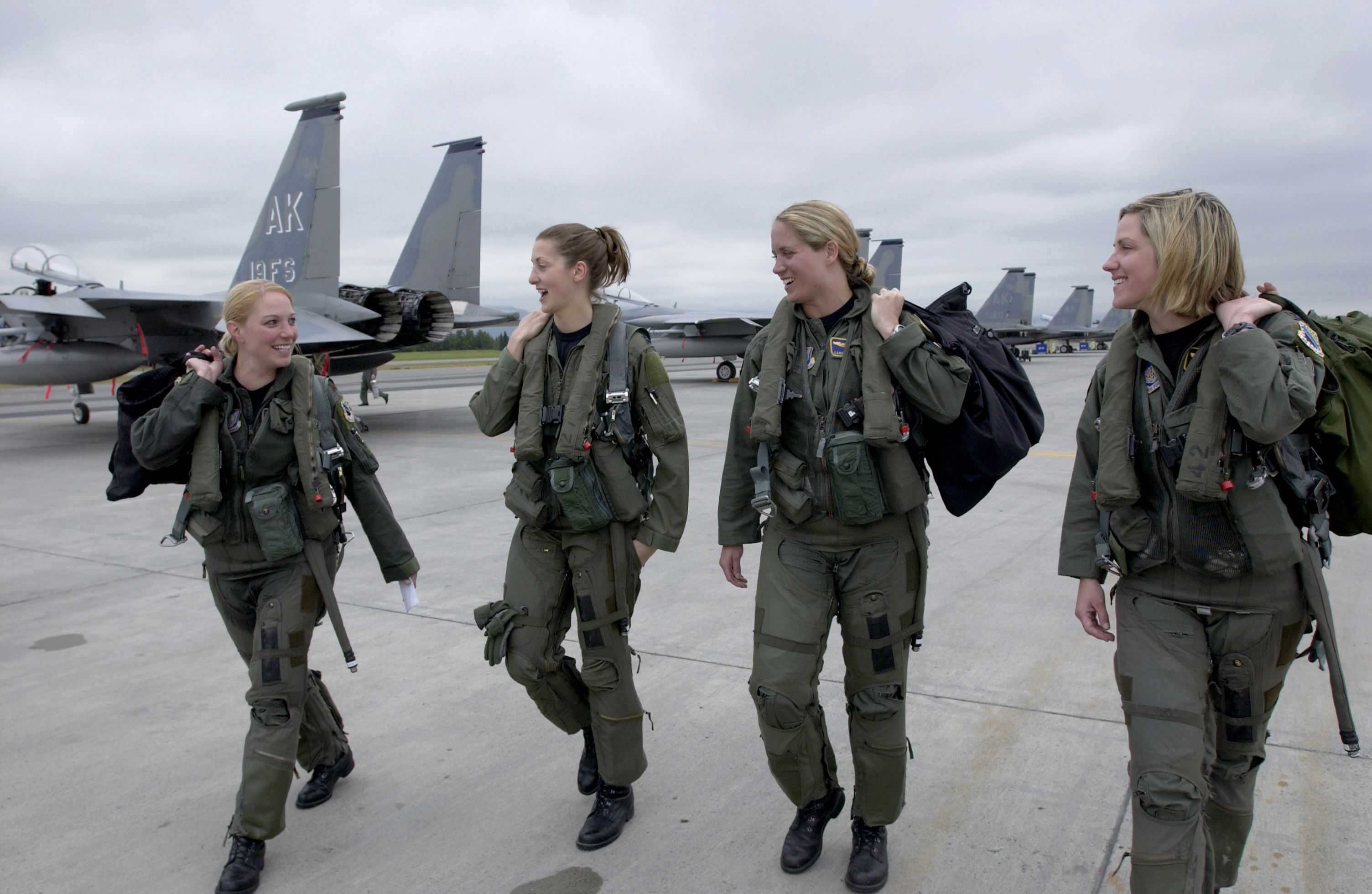 4 women military pilots 4 women military pilots walking away from jet