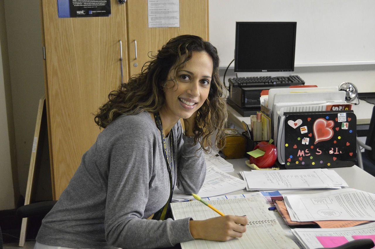 woman Professor working at her desk in her office