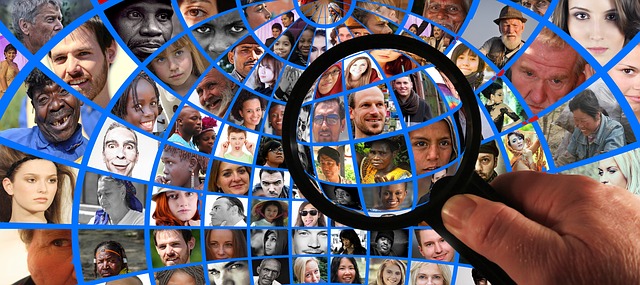 magifying glass showing people